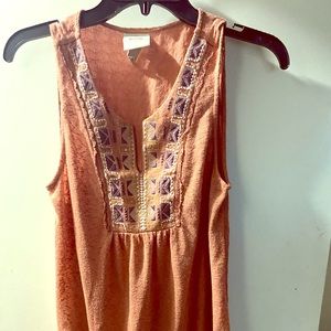 Sleeveless shirt with a cute design
